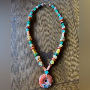 Stone pendant and necklace one of a kind.